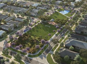 An aerial render of a new estate with homes around a central park