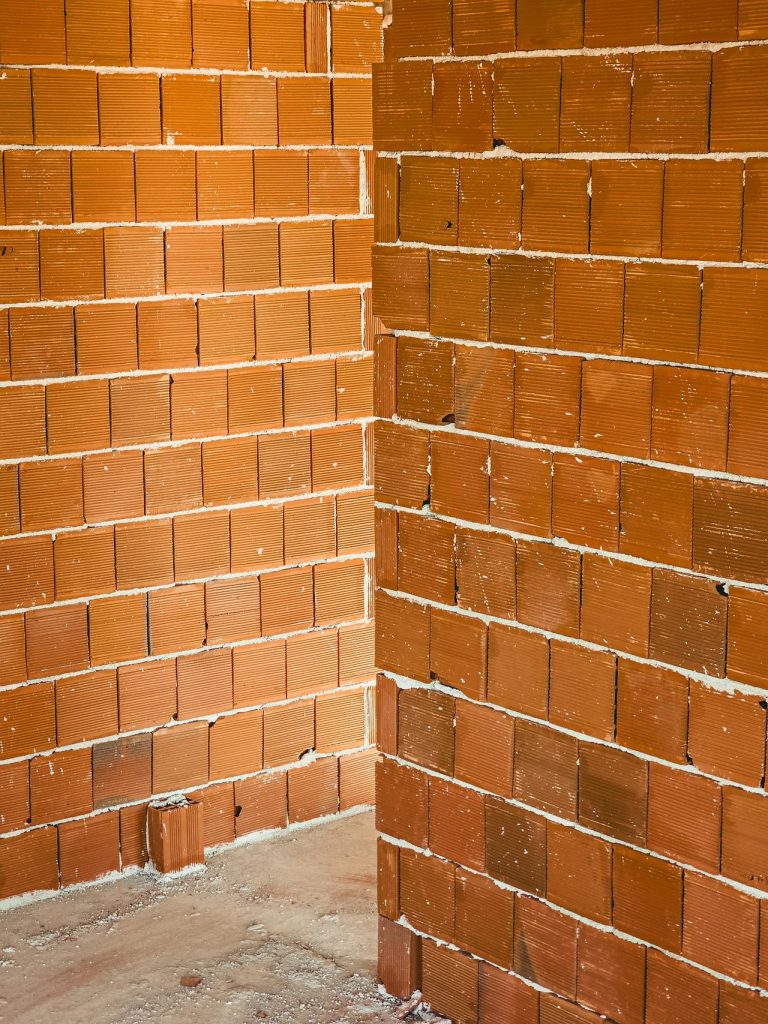 The brick walls of a new home at lock-up stage